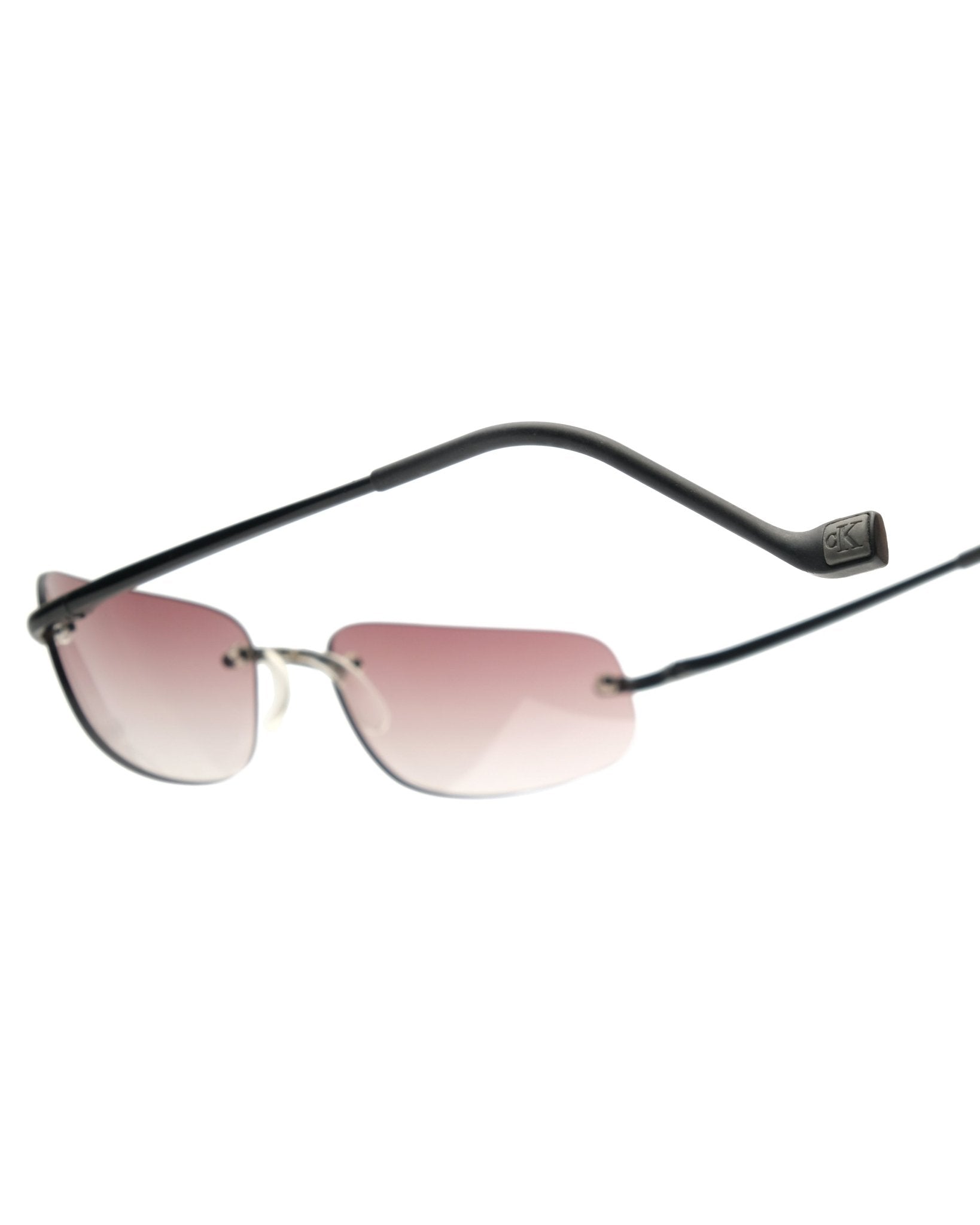 Calvin Klein - Calvin Klein rimless sunglasses vintage Vintage Sunglasses – The Dryads